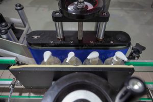 Wrap-Around Round Bottle Labeling Machine