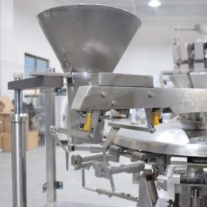Powder/Liquid/Powder Rotary Multi-Function Doypack Machine